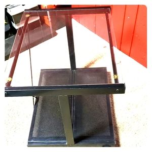 Rolling glass table part of a  Dusk